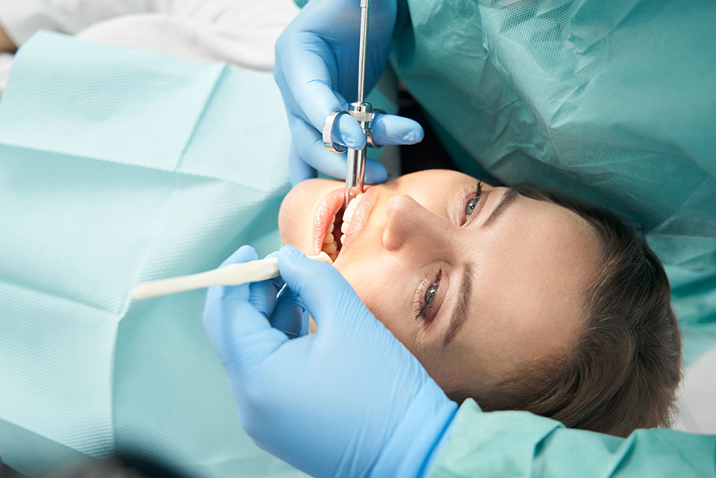 Photo of a woman-receiving-dental-treatment